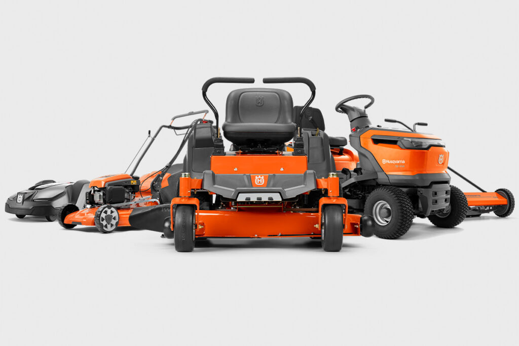 A range of Husqvarna mowers in a studio, now available at Cutting Edge in Zimbabwe.